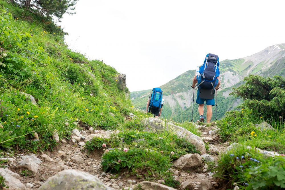a couple hiking in the mountains