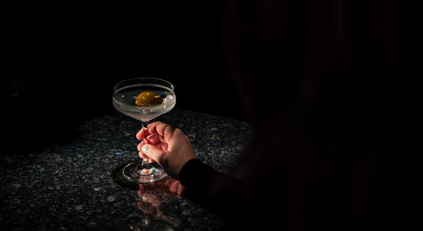 non-alcoholic martini against a dramatic black background
